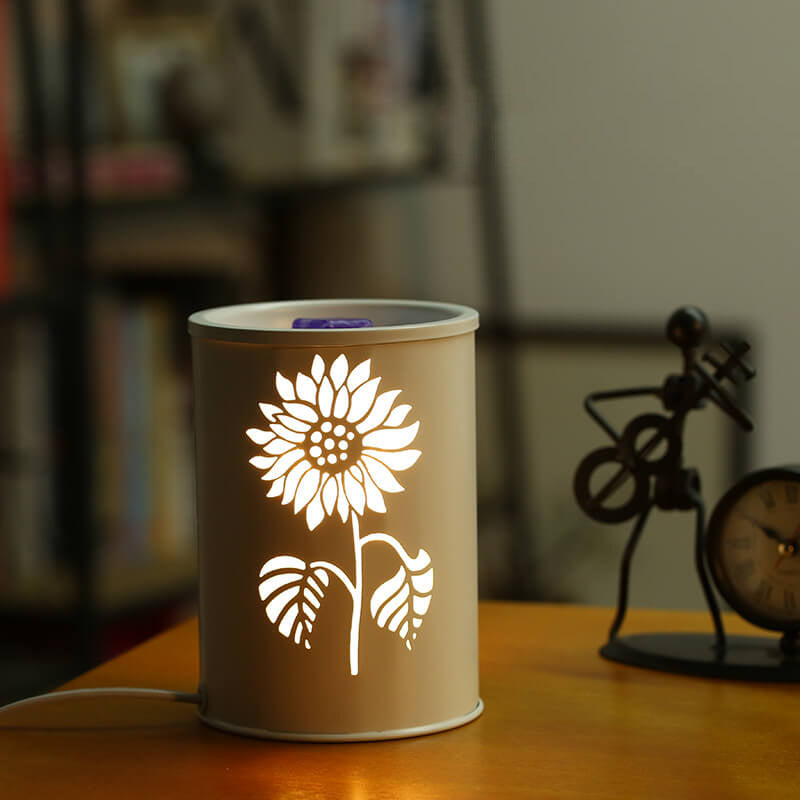 Modern cylindrisk vaxlampa – blommönster med aromaterapiglöd Save translation