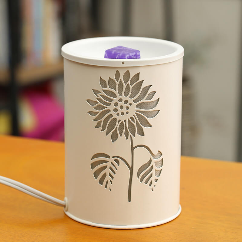 Modern cylindrisk vaxlampa – blommönster med aromaterapiglöd Save translation