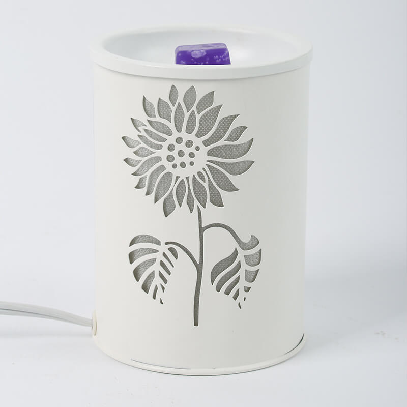 Modern cylindrisk vaxlampa – blommönster med aromaterapiglöd Save translation