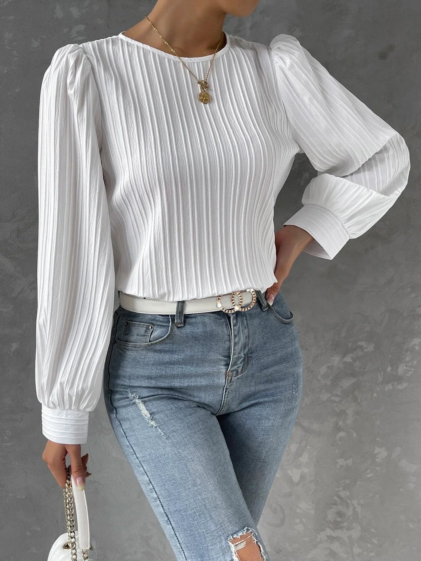 Damblus med textur och långärmad design – Elegant topp med avslappnad passform och modern, sofistikerad stil