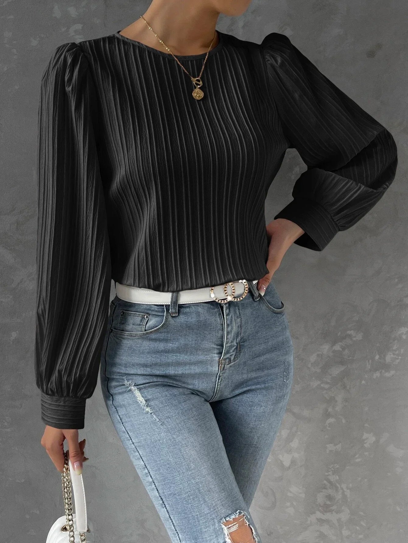 Damblus med textur och långärmad design – Elegant topp med avslappnad passform och modern, sofistikerad stil