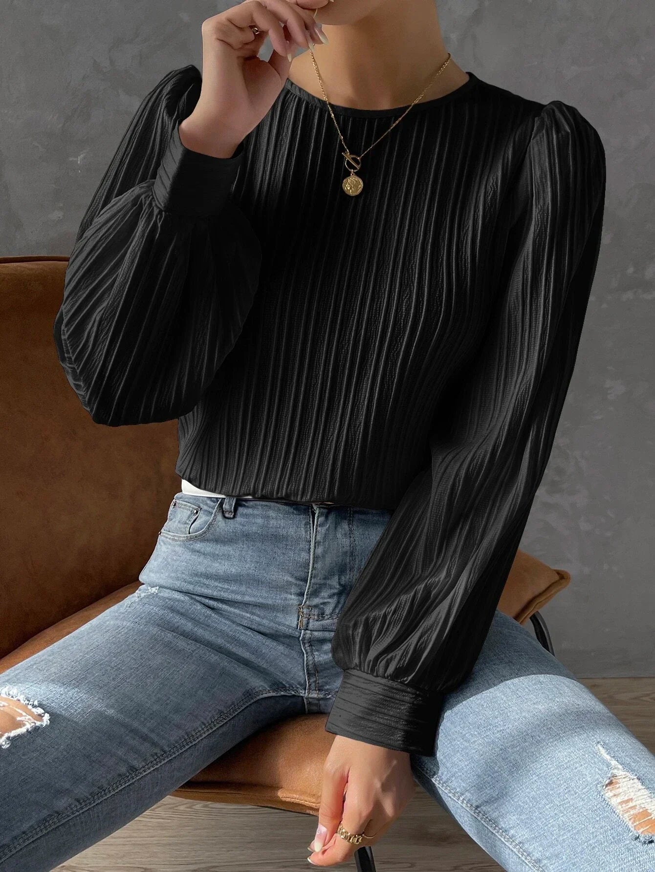 Damblus med textur och långärmad design – Elegant topp med avslappnad passform och modern, sofistikerad stil
