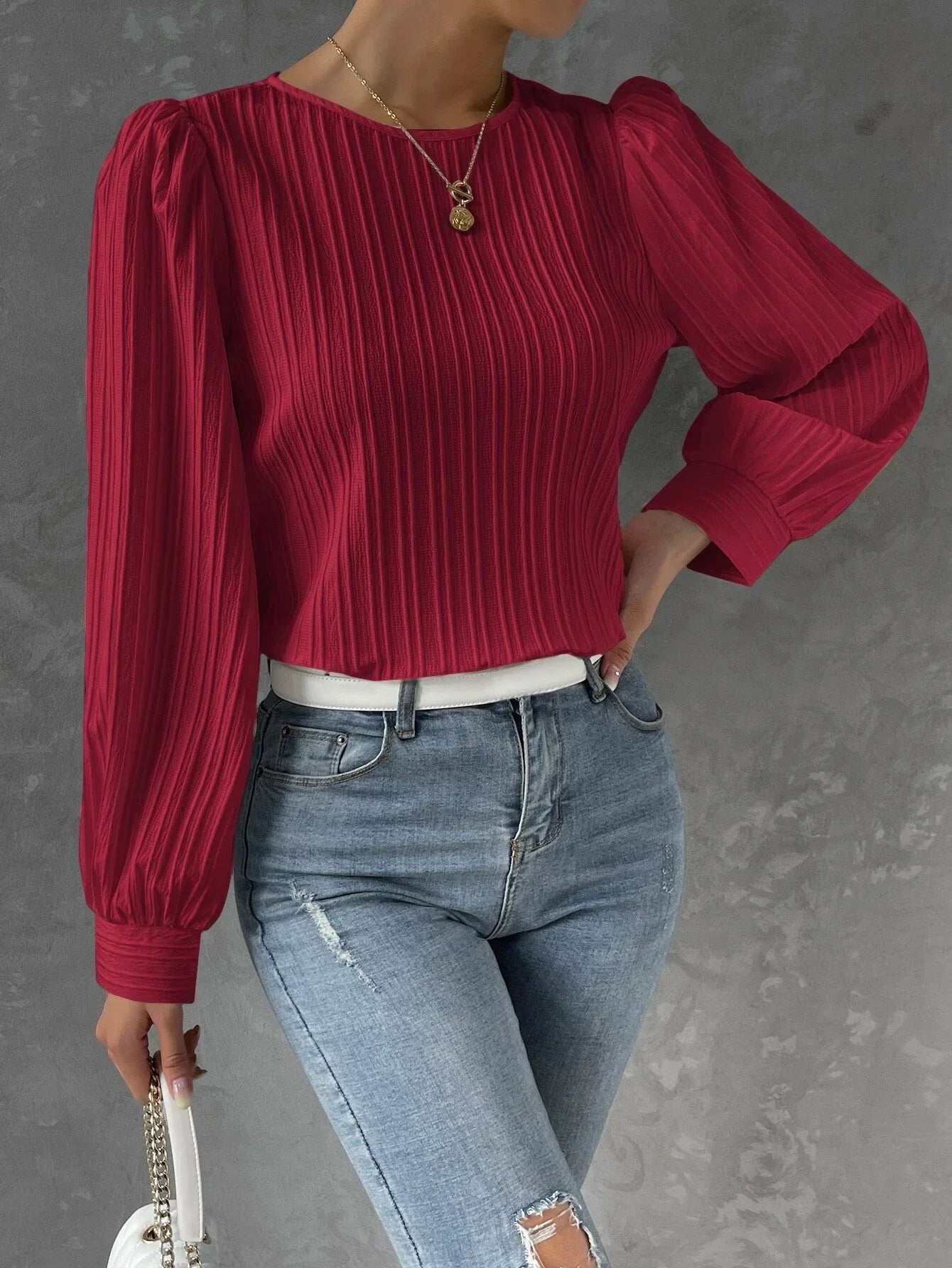 Damblus med textur och långärmad design – Elegant topp med avslappnad passform och modern, sofistikerad stil