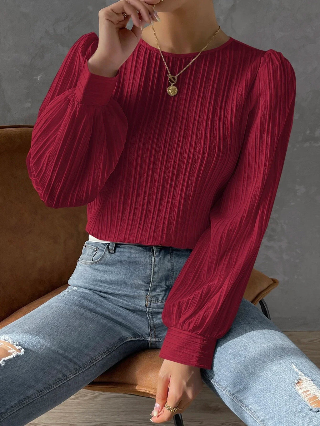 Damblus med textur och långärmad design – Elegant topp med avslappnad passform och modern, sofistikerad stil