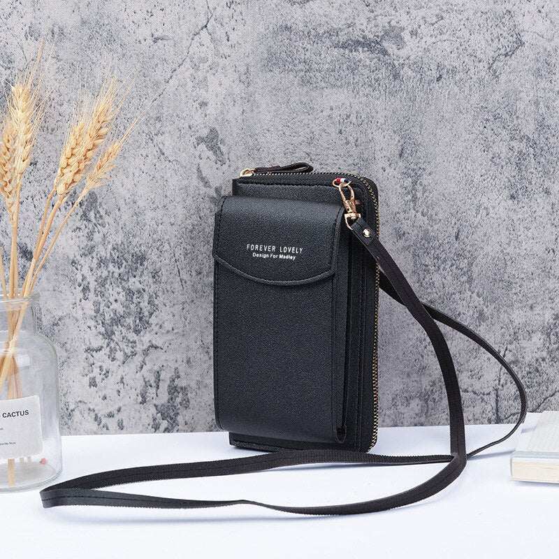 Lexie crossbody-väska med flera fickor