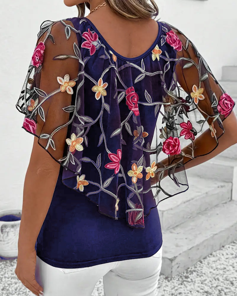 Transparent blus med blommig brodering för kvinnor