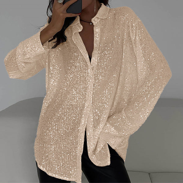Damblus med glitter och paljetter – Avslappnad festtopp med eleganta långa ärmar