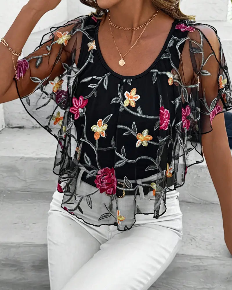 Transparent blus med blommig brodering för kvinnor