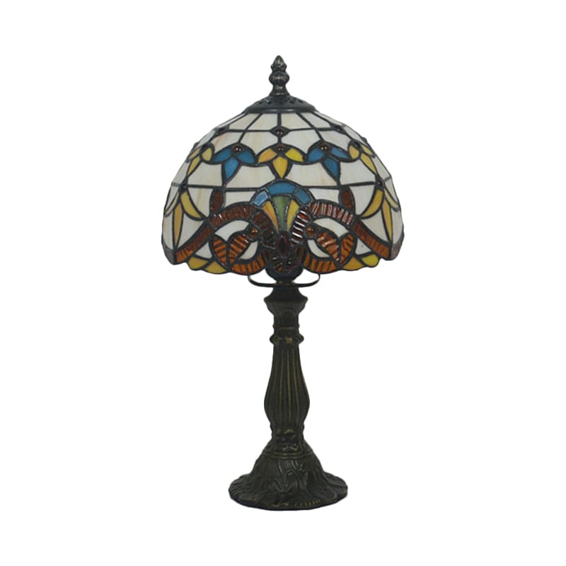 Strålande glödlampa i målat glas
