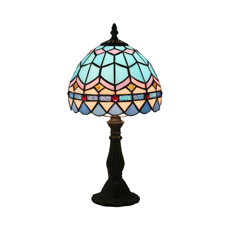 Strålande glödlampa i målat glas