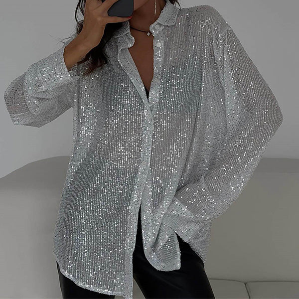 Damblus med glitter och paljetter – Avslappnad festtopp med eleganta långa ärmar