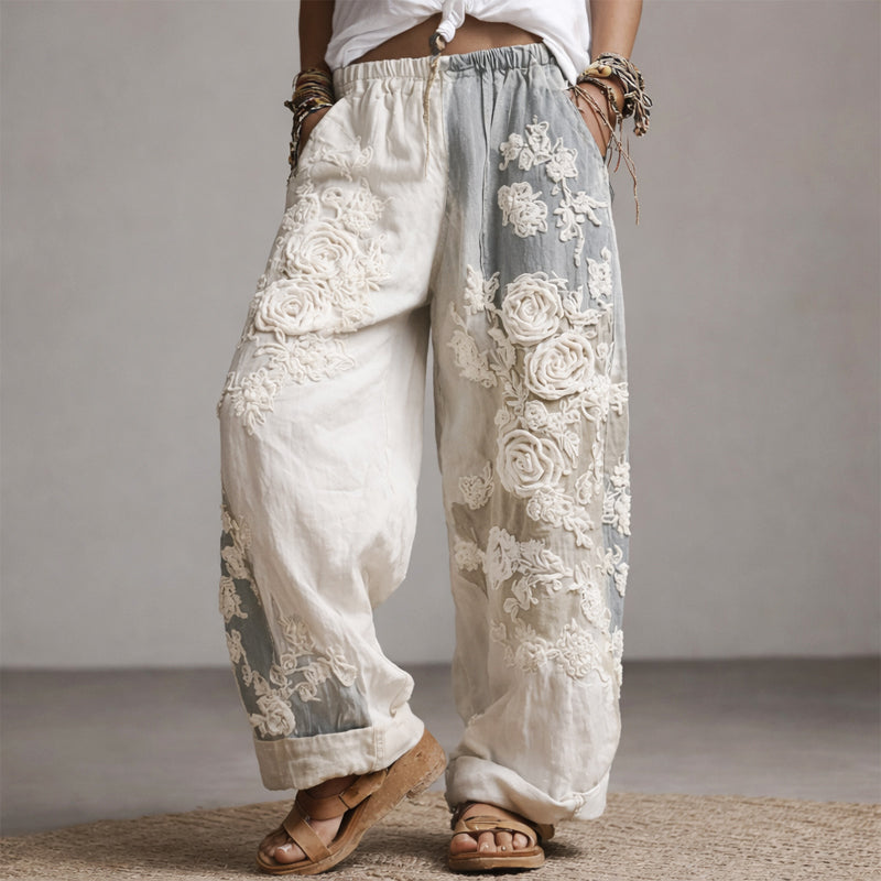 Colette | Blommiga Palazzo-byxor med broderi – Vida byxor med botaniska detaljer