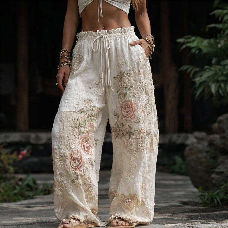 Colette | Blommiga Palazzo-byxor med broderi – Vida byxor med botaniska detaljer