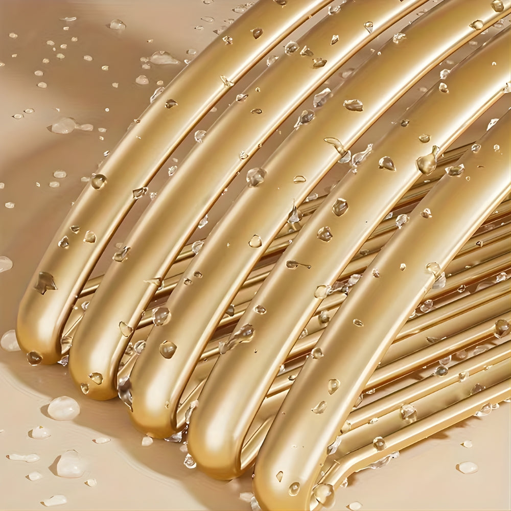 Designerstil guldfärgade metallgalgar – Elegant garderobslösning