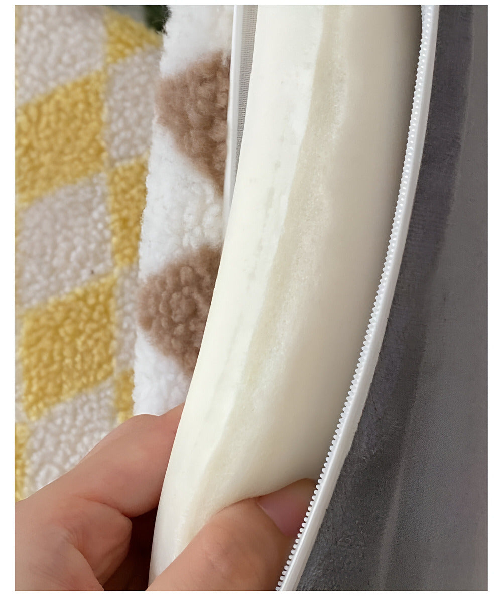 Mjuk dyna och stolsunderlag i polarfleece – nordisk rutig design för varma och mysiga sittplatser