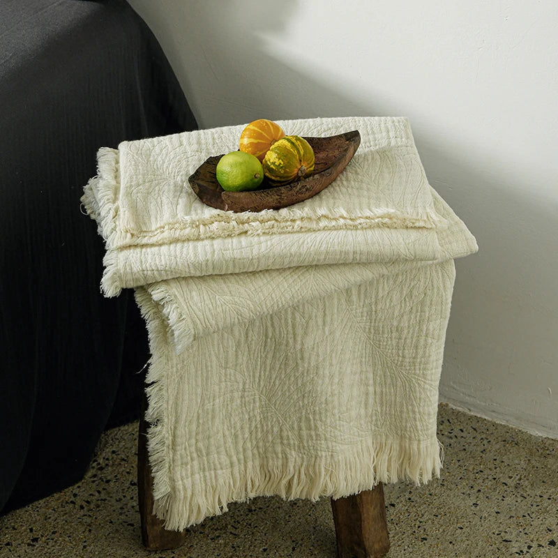 Mjuk muslinfilt i bomull med snyggt mönster och dekorativa tofsar – Mysig hemfilt