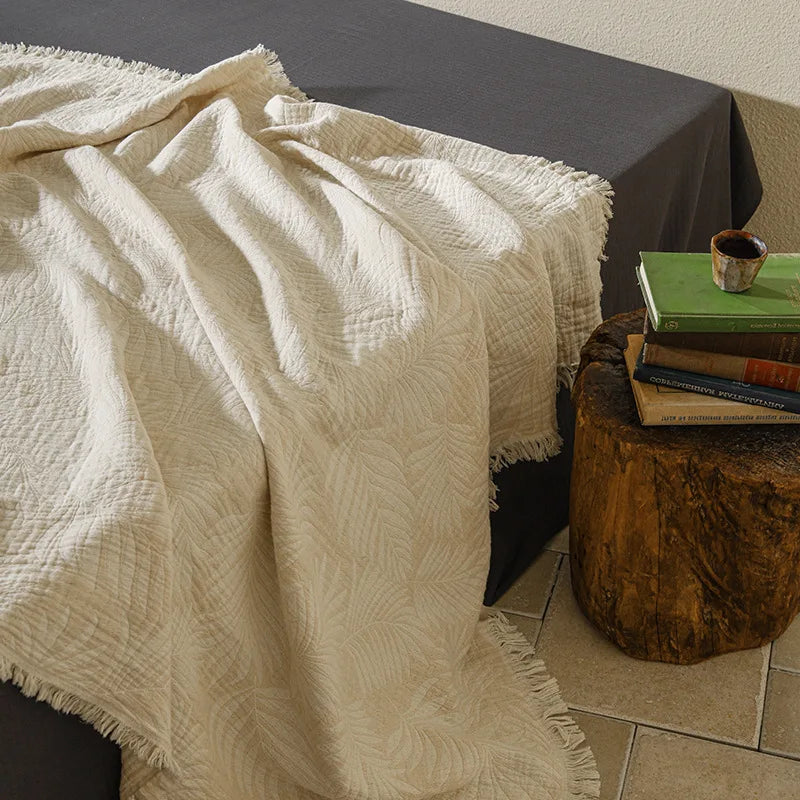 Mjuk muslinfilt i bomull med snyggt mönster och dekorativa tofsar – Mysig hemfilt