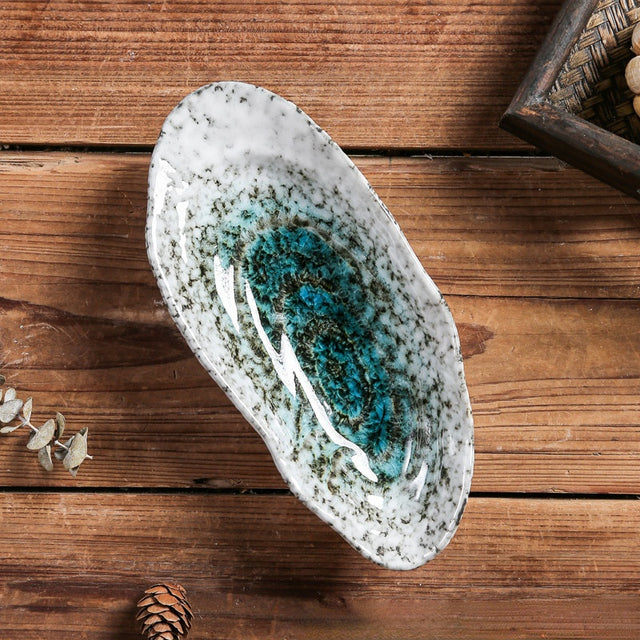 Keramikdekor med kustsnäckor – Elegant havsinspirerad vas och heminredning