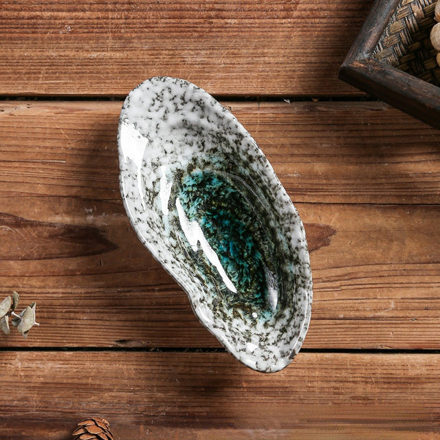 Keramikdekor med kustsnäckor – Elegant havsinspirerad vas och heminredning