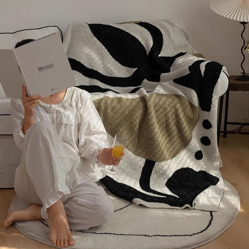 Mjuk och varm överkast – perfekt för avkoppling, läsning eller mysiga hemmakvällar