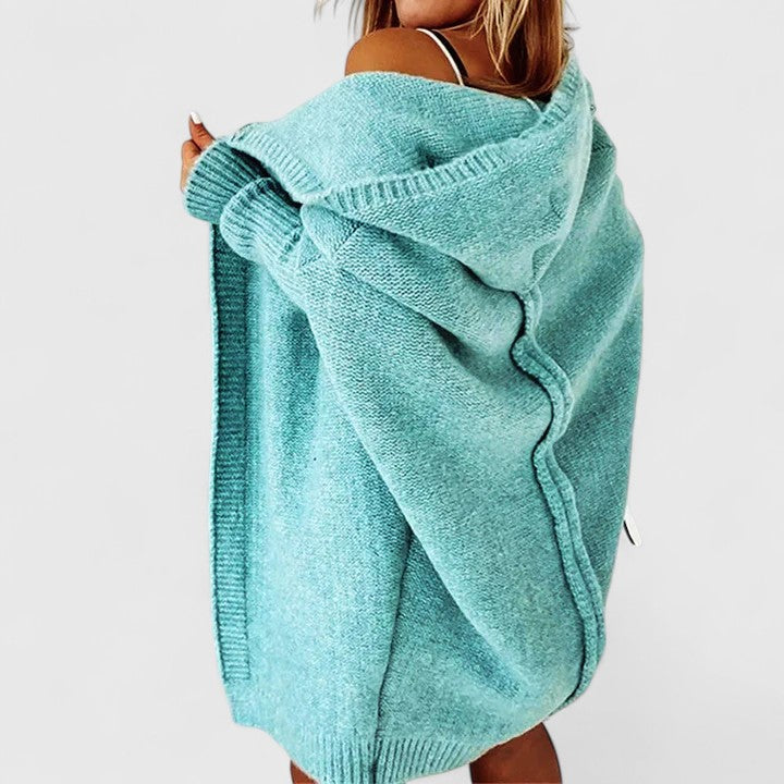 Evadne | Kofta med huva, öppen front och fladdermusärm – oversized-modell med ribbade muddar
