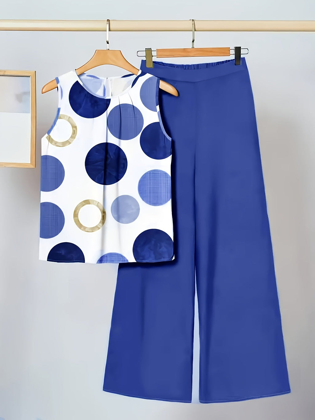 Valerisse | Set med prickig ärmlös blus och vida byxor - Snygg tvådelad outfit