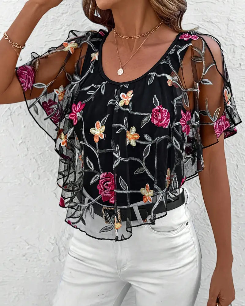 Transparent blus med blommig brodering för kvinnor