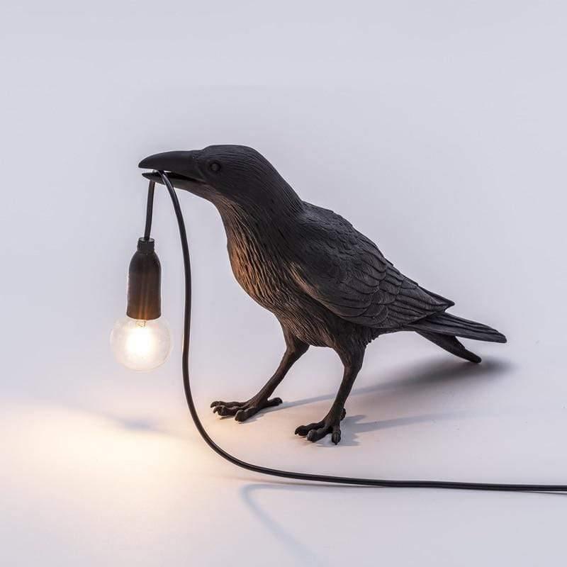 Skulptural bordslampa med djurmotiv – dekorativ belysning med hängande glödlampa