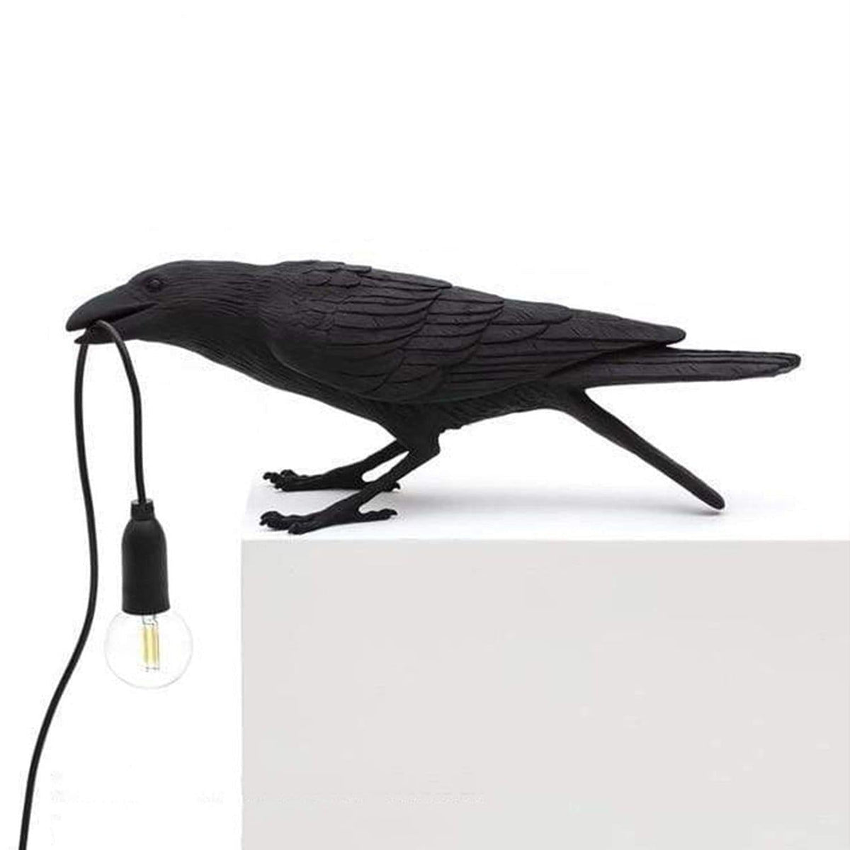 Skulptural bordslampa med djurmotiv – dekorativ belysning med hängande glödlampa
