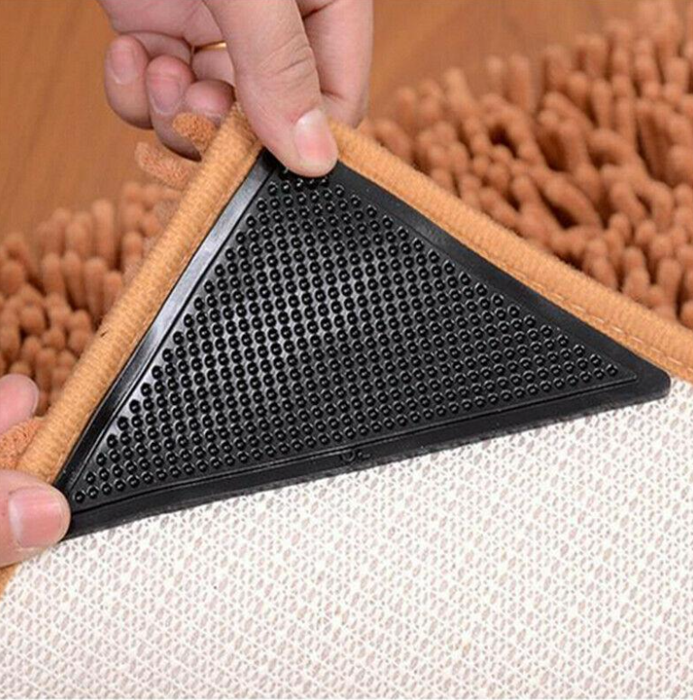 Återanvändbara hörngrepp för mattor – böjda och halkfria dynor för trägolv och släta golv