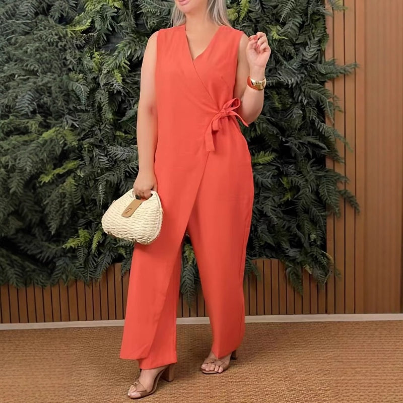 Ärmlös V-ringad jumpsuit – Damdräkt i ett stycke med korsade remmar och avslappnad silhuett