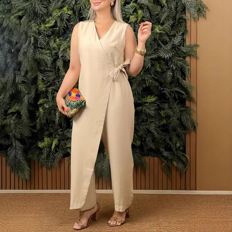Ärmlös V-ringad jumpsuit – Damdräkt i ett stycke med korsade remmar och avslappnad silhuett