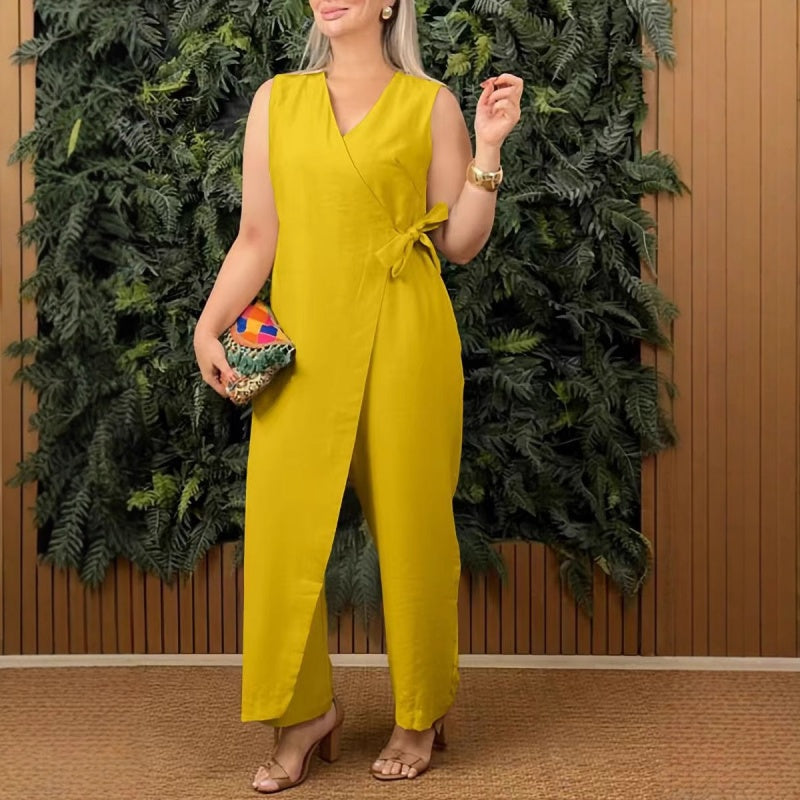 Ärmlös V-ringad jumpsuit – Damdräkt i ett stycke med korsade remmar och avslappnad silhuett