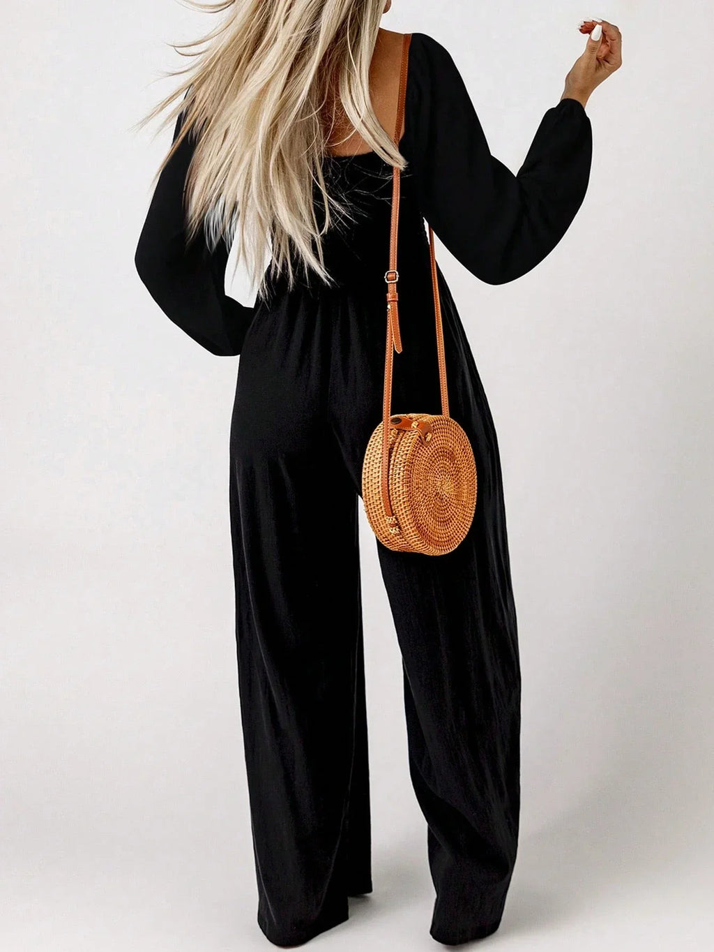 Damjumpsuit med charmig smockad midja – långärmad, avslappnad passform