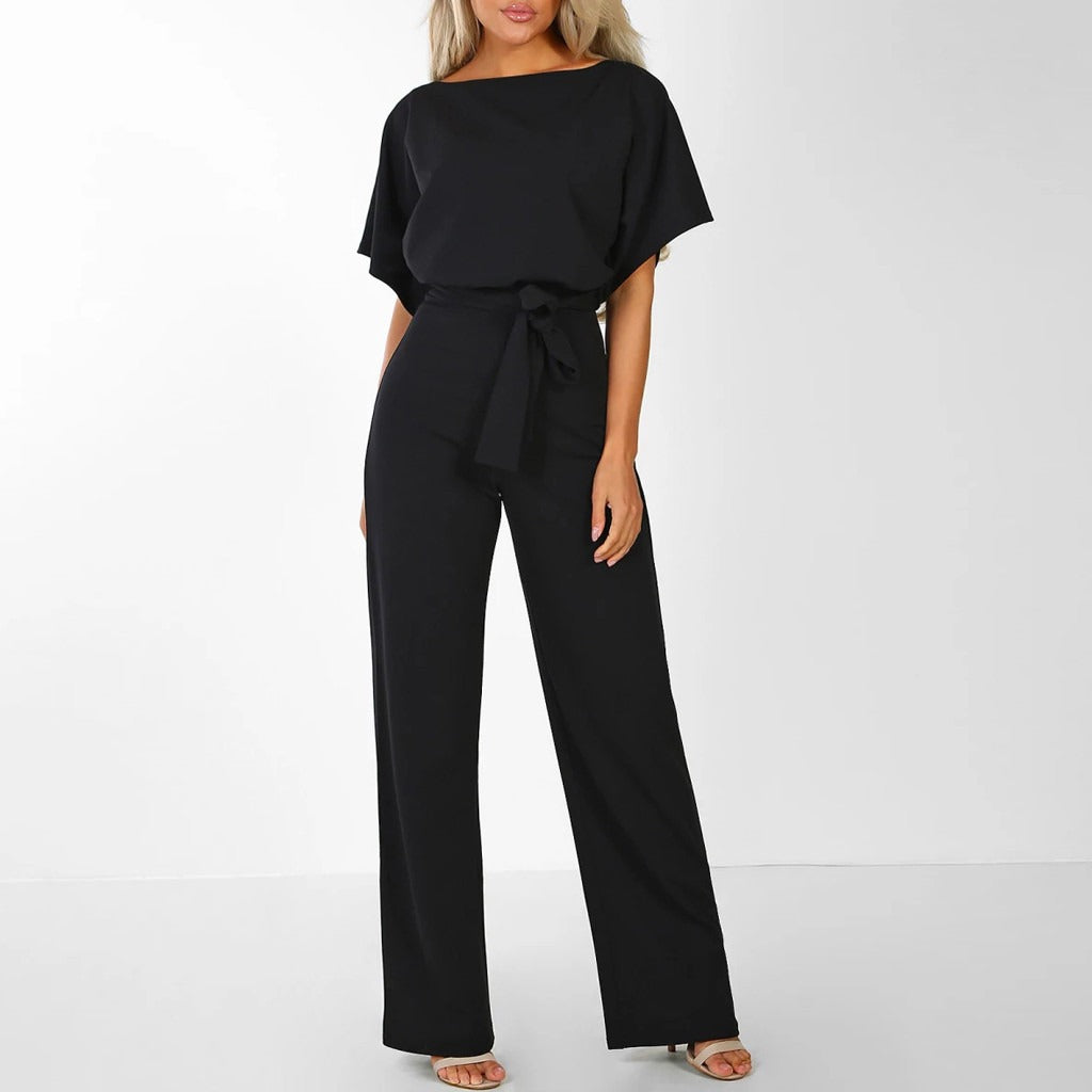 Damjumpsuit med böljande palazzo-motiv – Midjeåtsittande helkropp med otrolig elegans